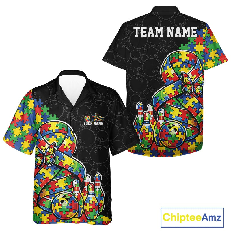 Button-up bowling shirt mockup featuring black shirt with large autism awareness ribbon filled with puzzle pattern, butterfly accents, and bowling strike artwork