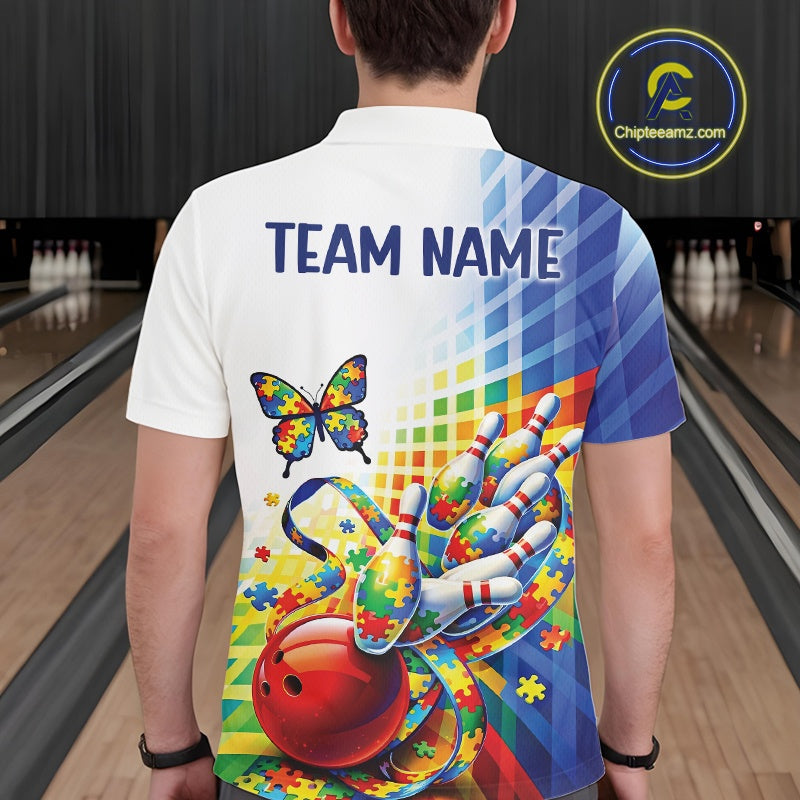 Male model at a bowling lane, back view of white and blue polo shirt showcasing puzzle bowling design with butterfly and ribbon accents
