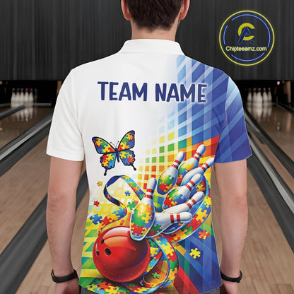 Male model at a bowling lane, back view of white and blue polo shirt showcasing puzzle bowling design with butterfly and ribbon accents
