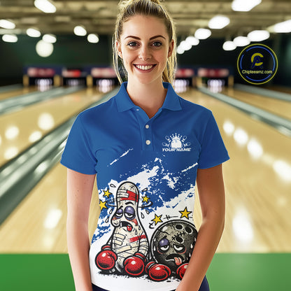 Female model in a bowling lane wearing a blue and white polo shirt, playful boxing bowling strike design with energetic sports feel.