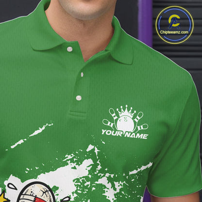 Close-up view of left chest area of a green and white polo shirt, showing small boxing-style bowling ball and pin graphic detail.