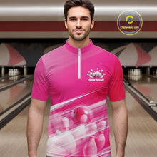 Load image into Gallery viewer, Male model front view in a bowling lane wearing a pink bowling quarter zip shirt with bowling ball and pins geometric artwork.