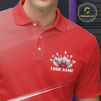Close up left chest view of a red bowling polo shirt with bowling ball and pins artwork blended into a pink geometric pattern.