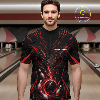 A man wearing a black short-sleeve zip-up bowling jersey with a red and black dragon with bowling pins and a bowling ball on the front. 