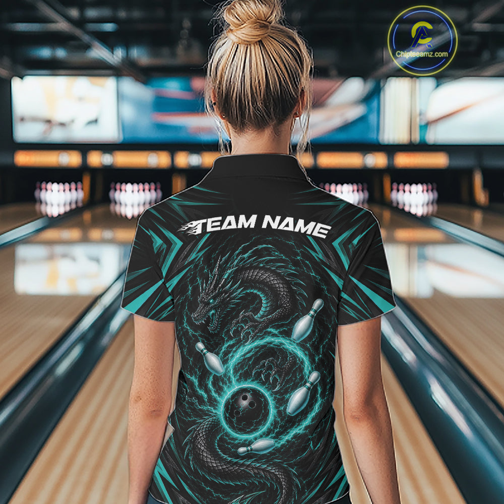 A woman viewed from behind wearing a black bowling-themed short-sleeve polo collared shirt with a large teal and black dragon graphic and the text 'TEAM NAME' across the upper back. 