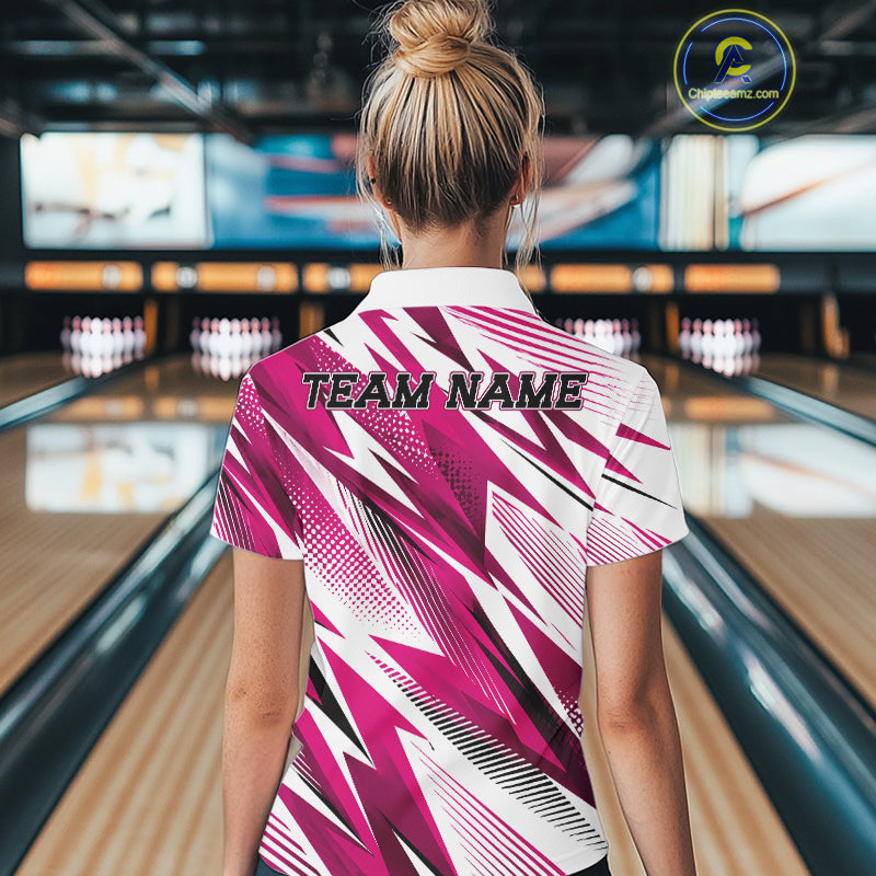 Person wearing a pink and white bowling shirt with 'TEAM NAME' text in a bowling alley.