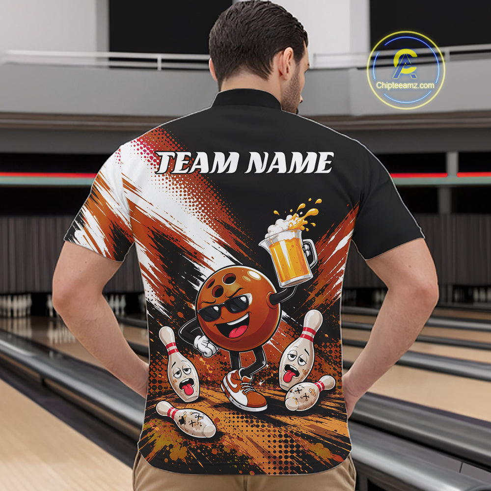 A man viewed from behind wearing a black short-sleeve quarter zip bowling-themed shirt with a large back graphic featuring a cartoon bowling ball character, bowling pins, beer foam, and the text 'TEAM NAME'. The background shows bowling lanes in a bowling alley.