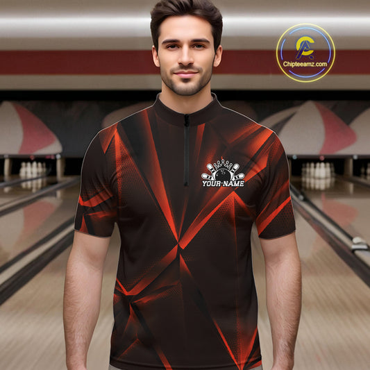 Man wearing a black and red bowling shirt with a personalized design in a bowling alley.