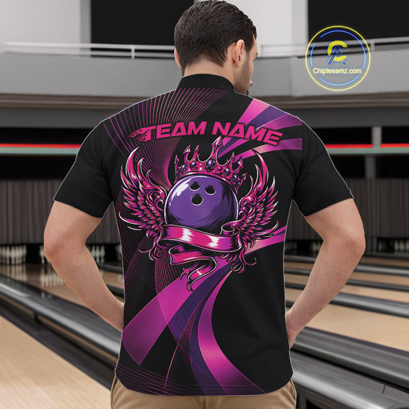 Person wearing a black bowling shirt with a purple and pink design on the back, standing in a bowling alley.
