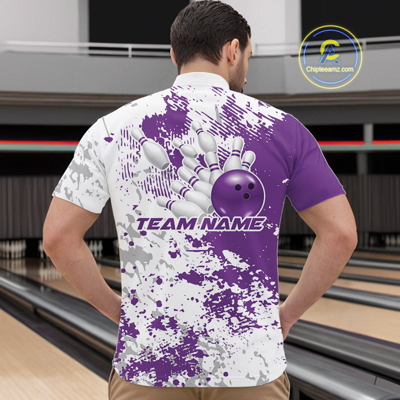 Male model in a bowling lane wearing purple and white quarter zip shirt, front view showcasing splatter pattern with clean abstract texture
