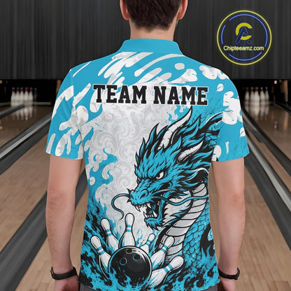 Person wearing a blue bowling shirt with a dragon design and 'TEAM NAME' text at a bowling alley.