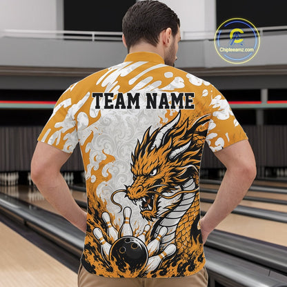 Man wearing a bowling shirt with a dragon design and 'TEAM NAME' text in a bowling alley.