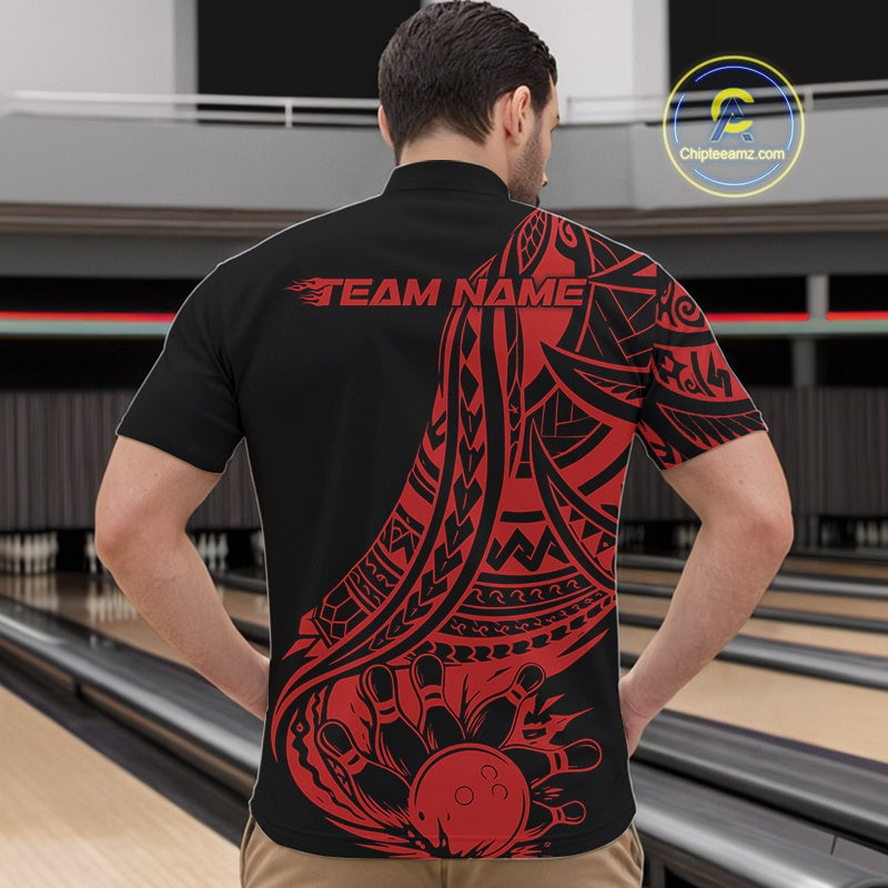 Person wearing a black quarter zip shirt with red tribal designs