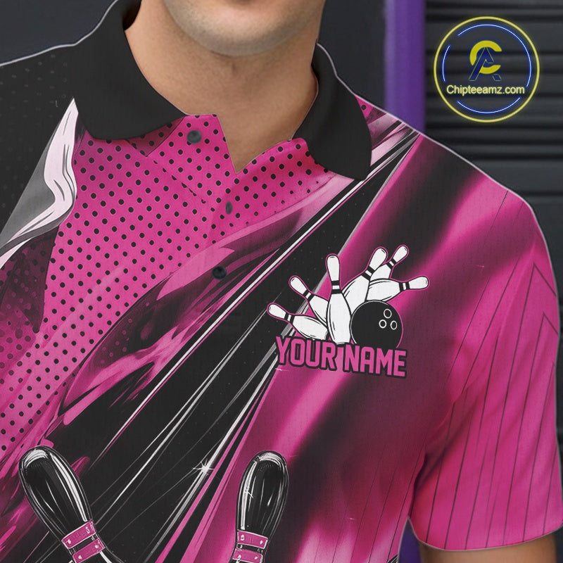 Left chest close-up of a black and pink bowling polo shirt featuring bowling strike artwork and motion streak details.