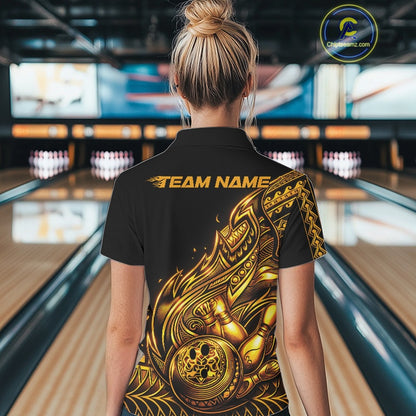 Back view of a female model in a black and gold bowling quarter-zip shirt featuring Polynesian-style bowling motifs.
