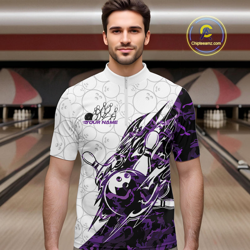 Male model wearing a white bowling quarter-zip shirt at the bowling lane with bowling ball and pin graphics accented by sharp purple camo streaks.