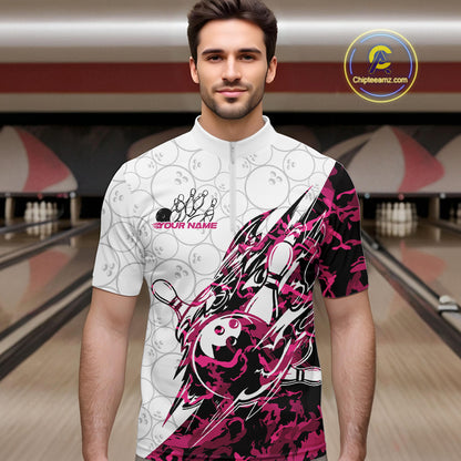 Male model wearing a white bowling quarter-zip shirt at the lane with pink camo-inspired bowling graphics and subtle bowling ball patterns.