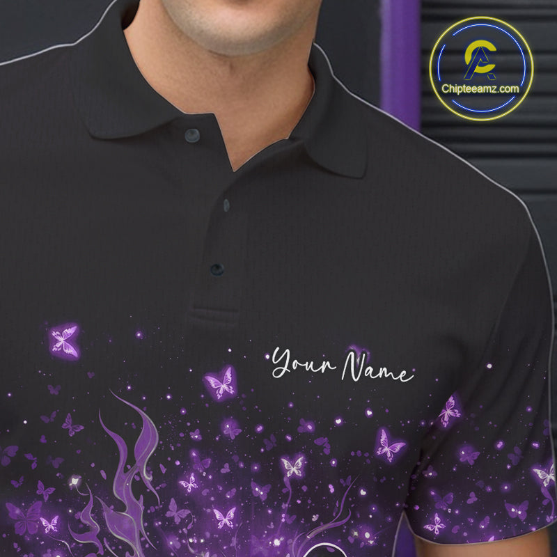 Close-up left chest detail of a black and purple bowling polo shirt featuring sparkly butterflies and flame accents.