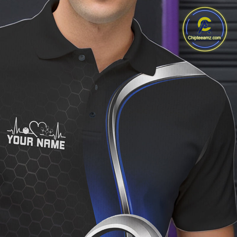 Close-up of the left chest area of a black and blue bowling polo shirt, featuring honeycomb pattern and a heart-shaped bowling strike design.