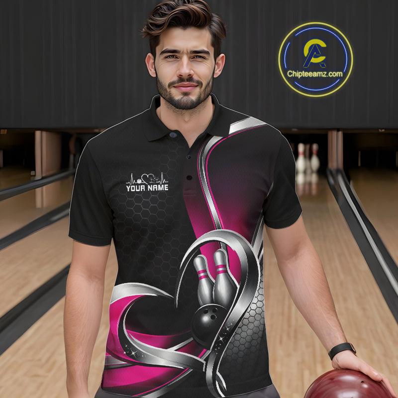 Male model in a bowling lane wearing a black and pink polo shirt with honeycomb texture and a heart-framed bowling strike illustration.