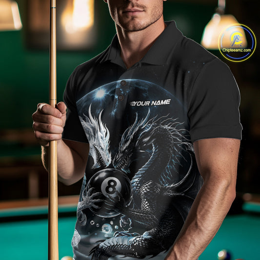 A man wearing a black polo shirt with a detailed graphic of a silver dragon wrapping around an 8-ball pool bill under a blue starry sky