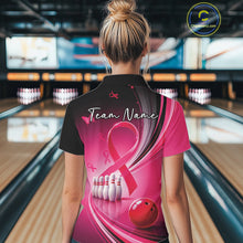 Load image into Gallery viewer, Back view of a female model in a black and pink bowling quarter zip featuring breast cancer awareness ribbons and bowling graphics