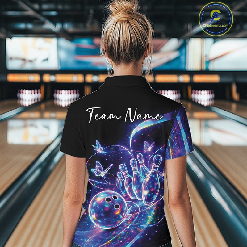 Back view of a female model wearing a black bowling quarter zip with starry galaxy graphics, glowing neon swirls, and hologram butterflies