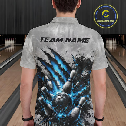 Back view of a male model wearing a gray bowling polo shirt showcasing a dramatic blue bowling ball and pins graphic with claw-mark artwork in a bowling lane.