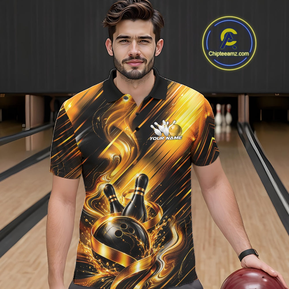 Front view of a male model wearing a bowling polo shirt showcasing a black and gold bowling ball hitting the pins graphic with flowing metallic ribbon accents in a bowling lane.