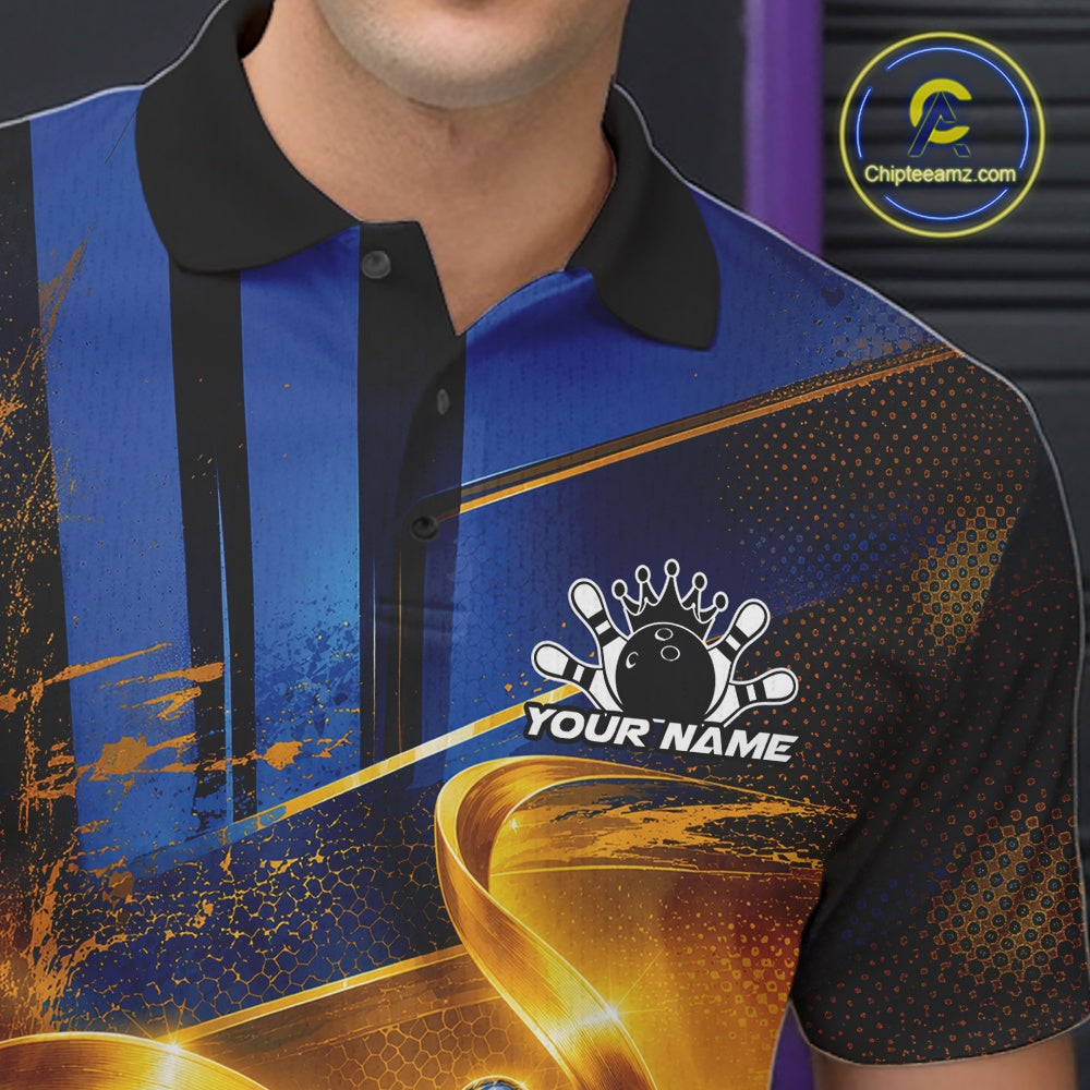 Close-up of the left chest on a bowling polo shirt featuring a glossy blue bowling ball and pins wrapped in flowing metallic gold ribbons.