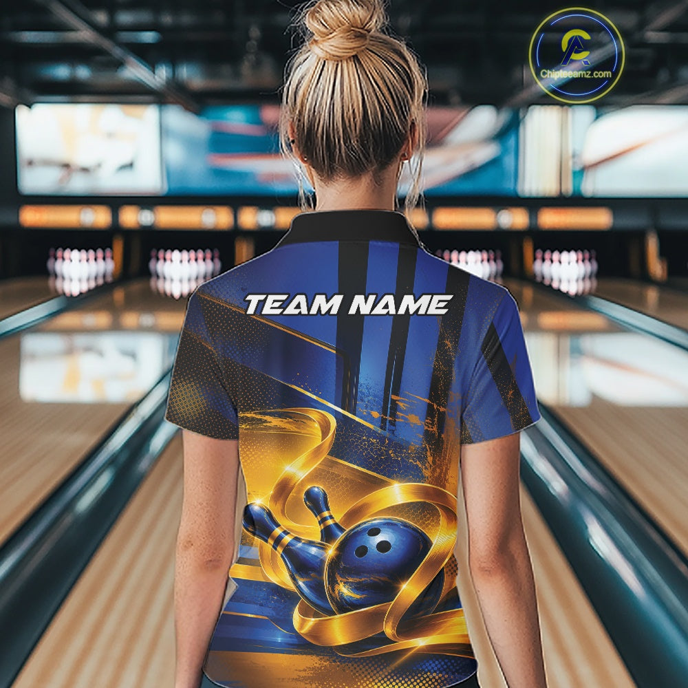 Back view of a female model wearing a bowling polo shirt featuring a glossy blue bowling ball and pins wrapped in elegant flowing gold ribbons at a bowling lane.