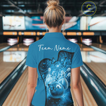 Load image into Gallery viewer, Back view of a female model wearing a blue bowling polo with butterfly artwork and bowling-themed graphics