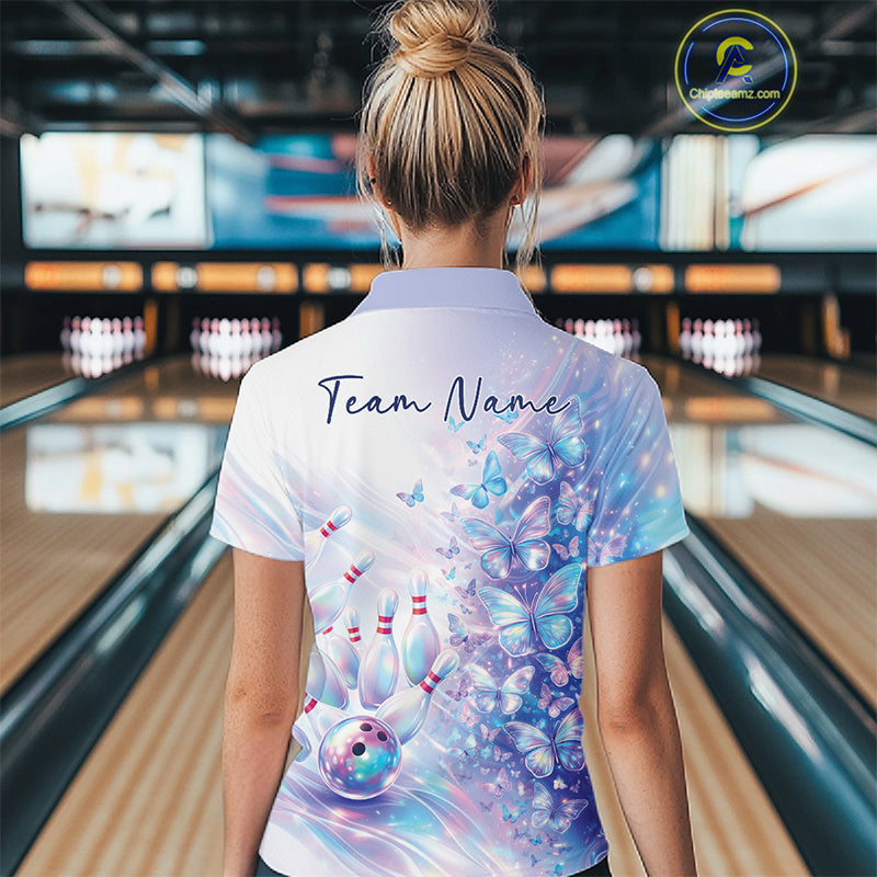 Back view of a female model wearing a bowling polo decorated with pastel purple and pink holographic butterflies and bowling graphics