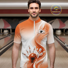 Load image into Gallery viewer, Male model at the bowling lane wearing a white and orange bowling quarter-zip shirt with wave-inspired artwork and a bowling strike design