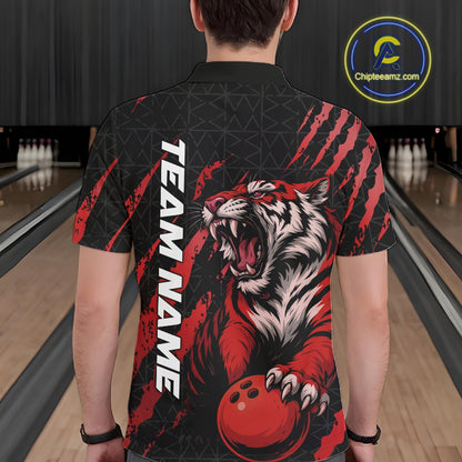 Back view of a male model wearing a black and red bowling polo shirt in a bowling lane, featuring a roaring tiger holding a red bowling ball with red claw-stripe artwork and a geometric background pattern.