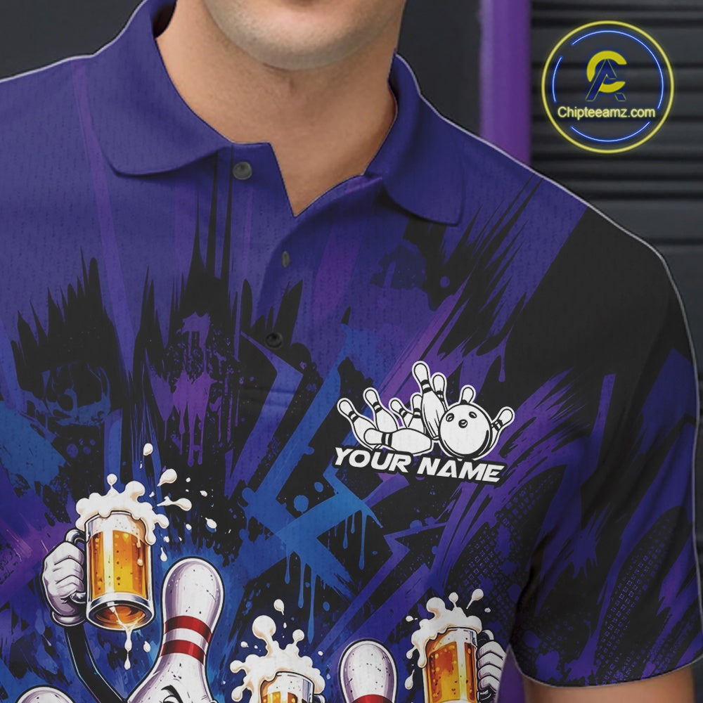 Close-up view of the left chest on a blue and purple bowling polo shirt featuring playful artwork of funny bowling pins and a bowling ball holding frothy beer mugs.