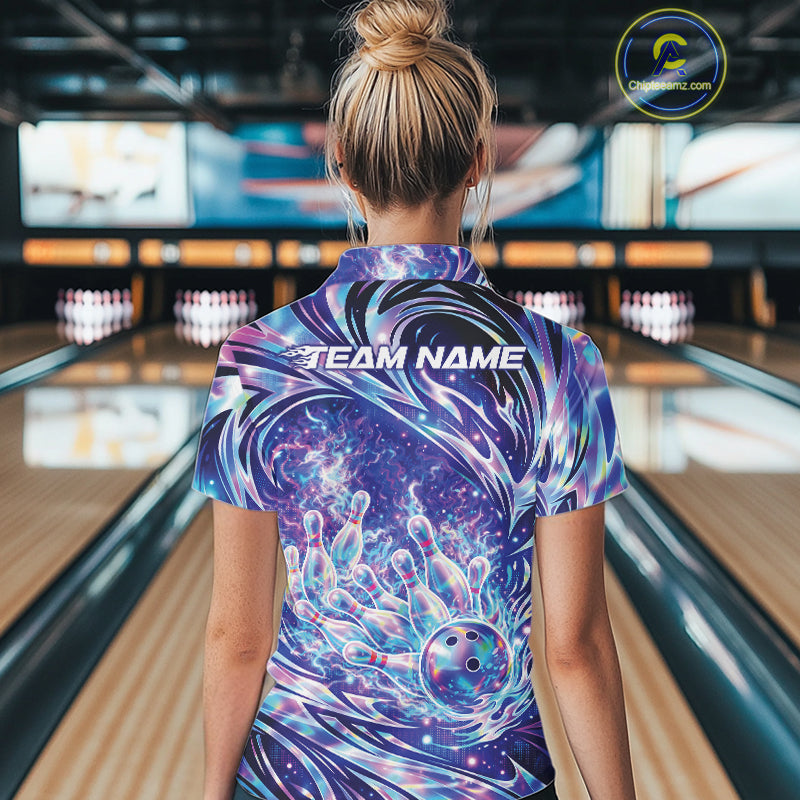Back view female model in bowling lane wearing quarter zip shirt featuring galaxy style bowling ball striking pins with vibrant cosmic bowling graphics.
