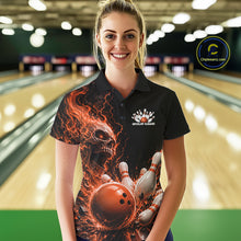 Load image into Gallery viewer, Front view of a female model in a bowling alley wearing a black bowling polo with an orange flaming skull, lightning, bowling pins, and a custom name.
