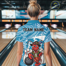 Load image into Gallery viewer, Back view of a female model in a bowling alley wearing a blue custom bowling polo shirt with a funny Cajun crawfish leaning on a bowling ball and a swamp-inspired texture background.
