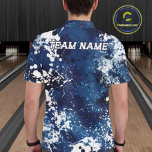Load image into Gallery viewer, Person wearing a blue and white patterned bowling shirt with 'TEAM NAME' on a bowling alley.