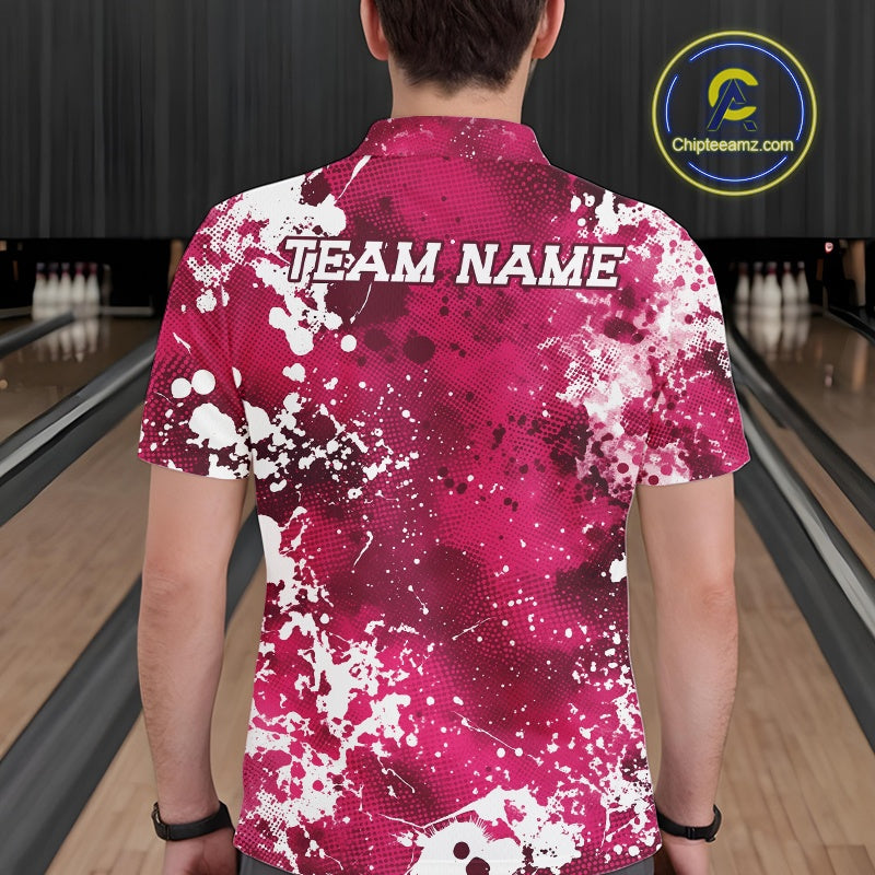 Person wearing a pink and white bowling shirt with 'TEAM NAME' on a bowling alley.