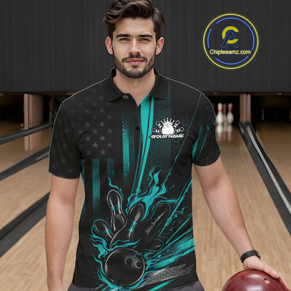 Male model wearing a black and turquoise blue bowling polo shirt at a bowling lane with patriotic bowling graphics and flame accents.