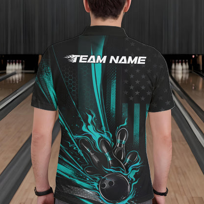 Back view of a male model in a bowling center wearing a black and turquoise blue polo showcasing bowling strike artwork with distressed flag styling.
