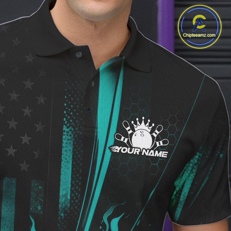 Close-up of a black and turquoise blue bowling polo shirt left chest featuring patriotic flames and bowling action graphics.