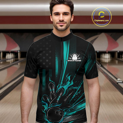 Male model wearing a black and turquoise blue bowling quarter-zip shirt at a bowling lane with patriotic bowling graphics and bold flag-inspired details.