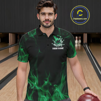 Close-up of a black and green bowling polo shirt left chest showing bowling ball crashing into pins with flames background design.