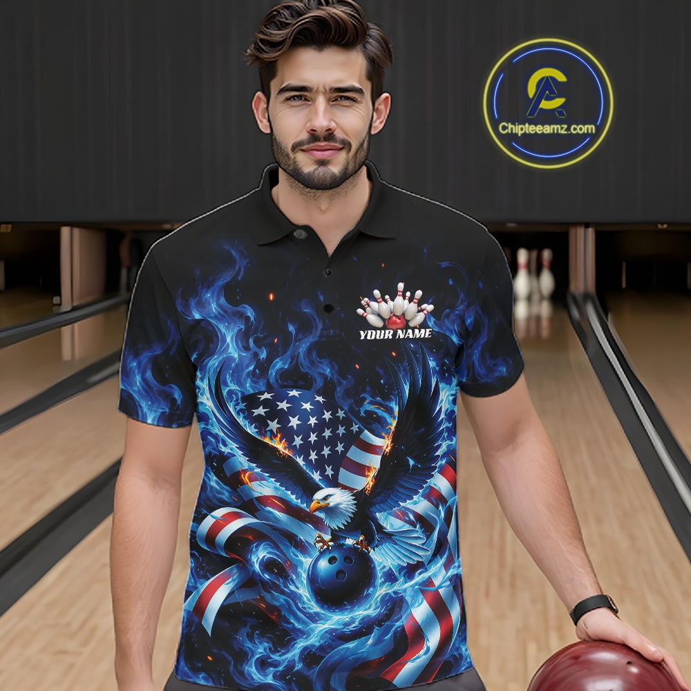 Front view of a male model at the bowling lane wearing a polo shirt with flaming eagle graphics, blue bowling ball, American flag, and blue flames.