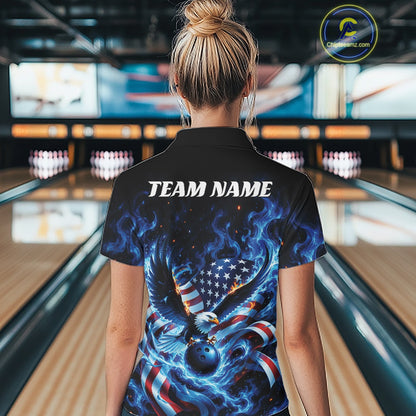 Back view female model in a bowling lane wearing a bowling polo shirt with flaming bald eagle, blue bowling ball, flag details, and blue flames.