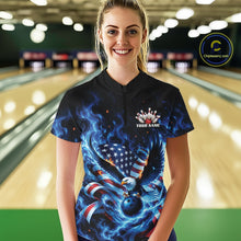 Load image into Gallery viewer, Front view of a female model in a bowling lane wearing a bowling quarter zip shirt with flaming eagle motif, blue bowling ball, and flag details.