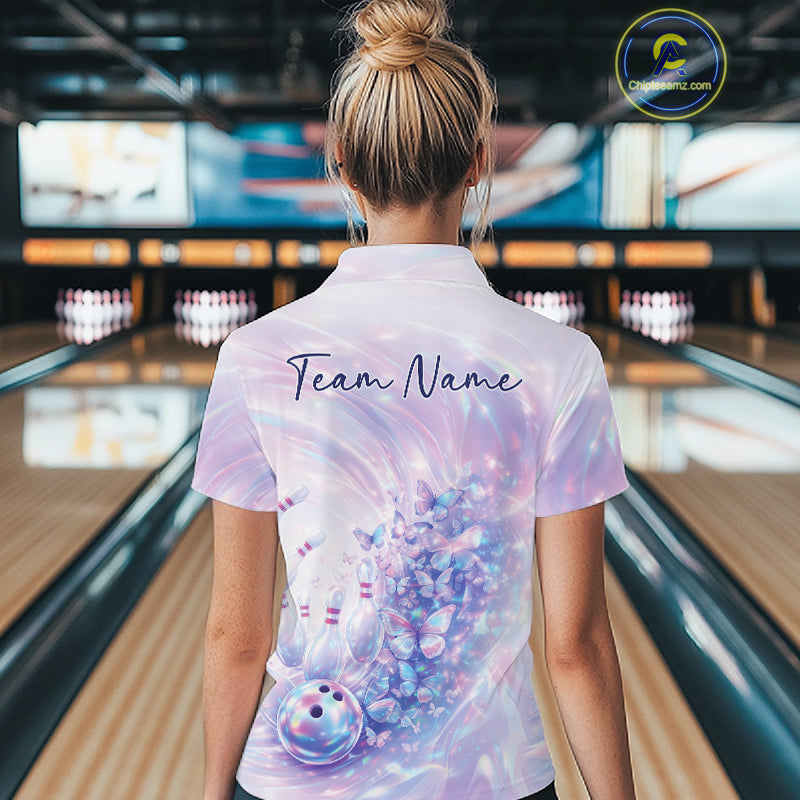 Back view of a female model wearing a bowling quarter zip featuring pastel purple and pink holographic butterflies with bowling-themed graphics